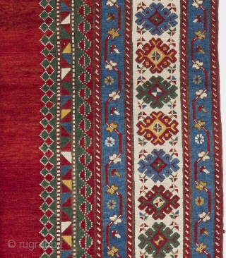 A top notch antique kazak rug with an eye catching plain red field, South Caucasus, ca 1890, 175x282 cm, very good condition, full pile, all original as found. Deep washed professionally.  