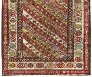 Colorful Caucasian Gendje Rug with diagonal stripes, 4 x 6.8 ft (119x203 cm), ca 1890                  