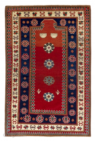 Unique Antique Kazak prayer rug, dated 1870. 4x6 Ft. (120x184 cm).  Wonderful natural dyed colors including purple, two blues, two greens, red, ivory and yellow. Lustrous wool pile, good condition. 14  ...