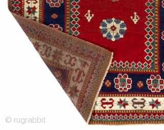 Unique Antique Kazak prayer rug, dated 1870. 4x6 Ft. (120x184 cm).  Wonderful natural dyed colors including purple, two blues, two greens, red, ivory and yellow. Lustrous wool pile, good condition. 14  ...