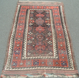 Baluch Rug, 19th Century, 1.04 x 1.81 m (3'5" x 5'11"). Original good condition despite some oxidation to the blacks.     www.rugspecialist.com        