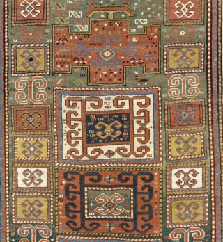 An impressive green ground Karachov (Karachop) Kazak Rug, 4.2 x 8.7 ft  (126x262 cm),  ca 1875.               