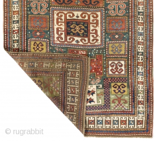 An impressive green ground Karachov (Karachop) Kazak Rug, 4.2 x 8.7 ft  (126x262 cm),  ca 1875.               