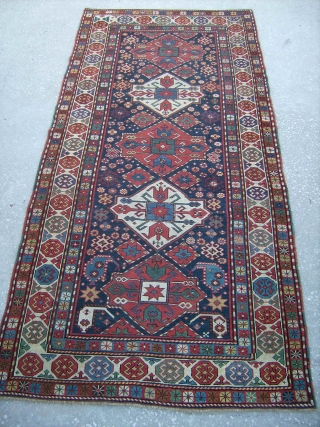 South Caucasian Long Rug, 116x241 cm, good condition, ca late 19th century, a label on the back reads: "St Ermins Hotel, 1914".   www.rugspecialist.com        