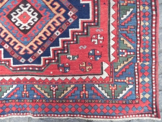 Large Caucasian triple medallion Kazak Rug, 257x143 cm, excellent condition, original ends and sides, late 19th century.                