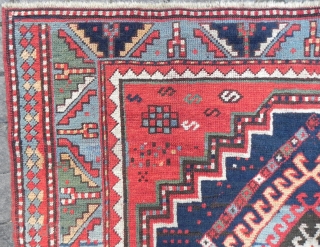 Large Caucasian triple medallion Kazak Rug, 257x143 cm, excellent condition, original ends and sides, late 19th century.                