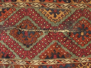 Anatolian Kurdish Yoruk rug. 50X79 Inches... 127X201 Cm. All intact with braided ends. Mostly good pile, some wear, dirty with washable stain and a crease cut as shown.     