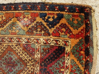 Anatolian Kurdish Yoruk rug. 50X79 Inches... 127X201 Cm. All intact with braided ends. Mostly good pile, some wear, dirty with washable stain and a crease cut as shown.     