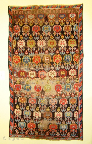 Armenian rug dated 1881 with inscription. What appears to be wear is mostly Oxidized brown and black...42X72 inches 3" narrower on top... 107X183 cm         