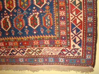 Caucasian Shirvan Prayer rug with abrashed blue field in great shape. 4'2"X5'9" OR 127X175 Cm. plus the original kilim/braded ends. All wool foundation, good short pile. Original sides rewrapped. A light small  ...