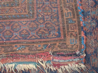 Battered but old Baluch Prayer Rug. Has remnant of the bottom end kilim and the left side has the original selvedge. Size: 38X50 inches 97X127 Cm       