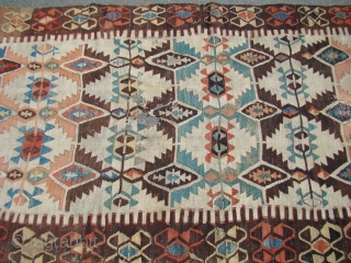 Anatolian Turkish Kilim. 4'4"X13'9"....132X420 Cm. Two damaged areas in the field as shown. Had a few braided "tail like" weaving on the backside.          