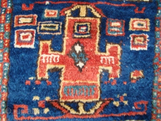 Karachof Kazak rug with full pile and intact kilim endings. Unusual directional pattern, great colors and lustrous wool. Two rough corners as shown and several secured holes that are visible from the  ...