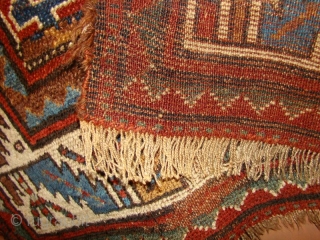 Kurdish rug with floppy handle and great natural dyes. 4' X 6'4"
The wool is very soft and shiny. All intact, wool foundation, some wear and a small repair as shown.   