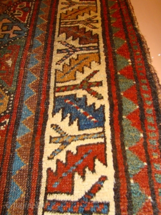 Kurdish rug with floppy handle and great natural dyes. 4' X 6'4"
The wool is very soft and shiny. All intact, wool foundation, some wear and a small repair as shown.   