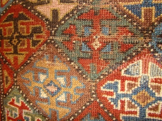 Kurdish rug with floppy handle and great natural dyes. 4' X 6'4"
The wool is very soft and shiny. All intact, wool foundation, some wear and a small repair as shown.   