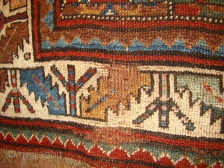 Kurdish rug with floppy handle and great natural dyes. 4' X 6'4"
The wool is very soft and shiny. All intact, wool foundation, some wear and a small repair as shown.   