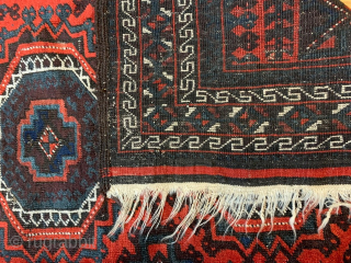 Antique Baluch rug with unusual pattern... Could be a prayer rug, note the change of inner Tree border at the top end..
With wear and small repairs as shown in the last two  ...