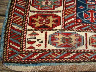 Sweet little Caucasian rug in great shape. All original with braided ends intact.
3x5 feet, 95X153 Cm. (2" wider at lower end and longer on left side)       