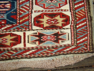 Sweet little Caucasian rug in great shape. All original with braided ends intact.
3x5 feet, 95X153 Cm. (2" wider at lower end and longer on left side)       