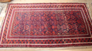 Large Baluch rug with great wool and floppy blanket like handle. 4.3x7.8                     