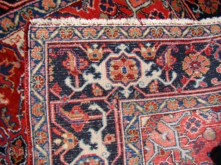 Pair of small Heriz rugs circa 1920 with full pile and natural colors. Size: 4'10"X6'10" and 4'10"X6'6"                