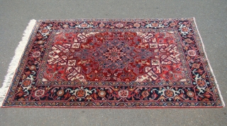 Pair of small Heriz rugs circa 1920 with full pile and natural colors. Size: 4'10"X6'10" and 4'10"X6'6"                