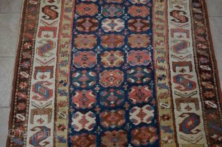 A very nice Kurdish runner, measures 4' x 8'8".  Stunning border, great condition.                   