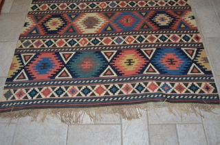 A wonderful Shirvan Kilim in excellent condition.  As you can see from the photographs, this has been taped for hanging.  Measures 9'7" x 4'4".  A great example.   