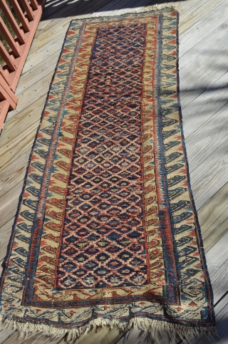 An early unusual Soumak carpet, measures 6'6" x 2'8".  Very nice condition.                    