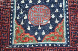 Very nice Tibetan carpet, measures 28 1/2" x 54".  Believe the piece to be around 1900, nice condition.              