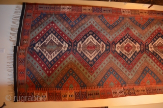 An extraordinary kilim, very large, measures 15' 7" long (add 6" for fringe) x 69" wide, 2 piece, the border has an incredible salmon color border.  The condition and colors are  ...