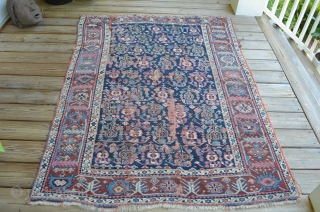 What we believe to be an Varamin Plain, wonderful age, extensive wear.  Measures 4' 5" x 6' 3".              