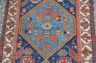 A very nice Northwest Persian runner, late 19th century.  Nice bold colors, age-appropriate wear, low areas.  Note loss to end.  Measures 11'4" x 3'2"      