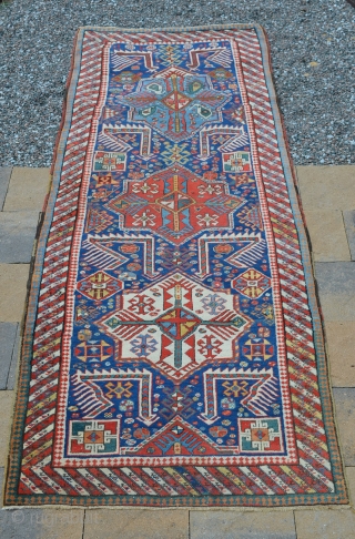 Beautiful early Akstafa, late 19th century.  Vivid colors, even wear.  Measures 9'3" x 3'5"                 