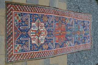 Beautiful early Akstafa, late 19th century.  Vivid colors, even wear.  Measures 9'3" x 3'5"                 