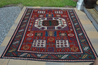 Karachopf Kazak, measures 5' 5" x 7' 7", end and field restoration, re-edged, a beautiful rug.                 