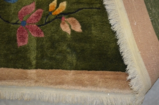 A very nice Nichols Art Deco Chinese rug circa 1920/1930.  Very pleasant neutral beige field.  Some corner damage, please see photos.  9'x12' Needs cleaning      