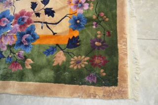 A very nice Nichols Art Deco Chinese rug circa 1920/1930.  Very pleasant neutral beige field.  Some corner damage, please see photos.  9'x12' Needs cleaning      