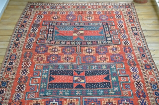 A very nice Kurdish carpet, circa 1900.  Measures 11'1" x 5'6".  Slight restoration to low browns.               