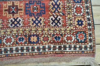 A very nice Kurdish carpet, circa 1900.  Measures 11'1" x 5'6".  Slight restoration to low browns.               