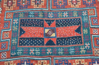 A very nice Kurdish carpet, circa 1900.  Measures 11'1" x 5'6".  Slight restoration to low browns.               