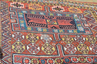 A very nice Kurdish carpet, circa 1900.  A couple of small repairs.  Great colors.  Measures 9'8" x 5'7"            