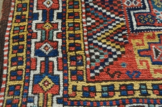 A very nice Kurdish carpet, circa 1900.  A couple of small repairs.  Great colors.  Measures 9'8" x 5'7"            