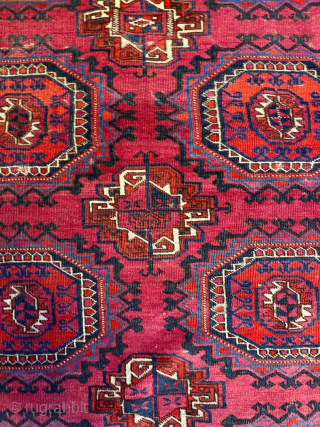 Tekke Turkmen Rug, late 20th century
Size: 320 × 201 cm (10'6" × 6'7")

A large Tekke rug with the traditional repeating gul pattern, framed by multiple geometric borders. The field is dyed in  ...