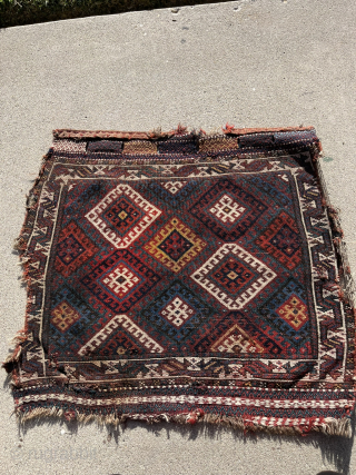Fine Jaff bag face with an unusual color palette featuring two purples. Nice saturated dyes. Obvious condition issues but still a really great piece with a good range of colors. The wonky  ...