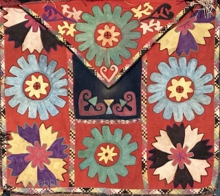 An exceptional example of an antique Uzbek Lakai Tribe silk embroidered Ilgich / Ayna Khalta hanging with false flap dating to the last quarter of 19th century. This large envelope shaped is  ...