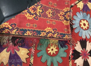 An exceptional example of an antique Uzbek Lakai Tribe silk embroidered Ilgich / Ayna Khalta hanging with false flap dating to the last quarter of 19th century. This large envelope shaped is  ...