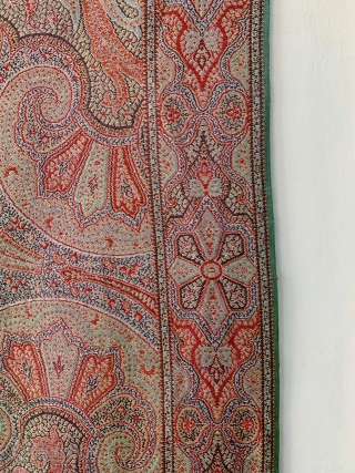 A beautiful antique Victorian Kashmir Paisley Shawl dating to the 19th century. It has an elegant design echoing the beauty of Indian Kashmir example. The colours are gorgeous. The weave is very  ...