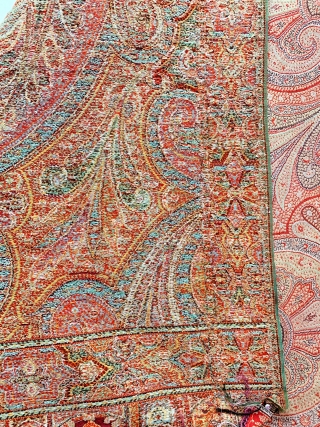 A beautiful antique Victorian Kashmir Paisley Shawl dating to the 19th century. It has an elegant design echoing the beauty of Indian Kashmir example. The colours are gorgeous. The weave is very  ...